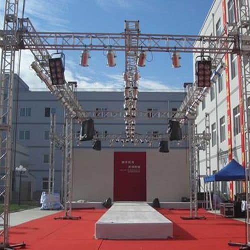 Outdoor Truss Stage with Overhead Lighting Rig – Red Carpet Runway