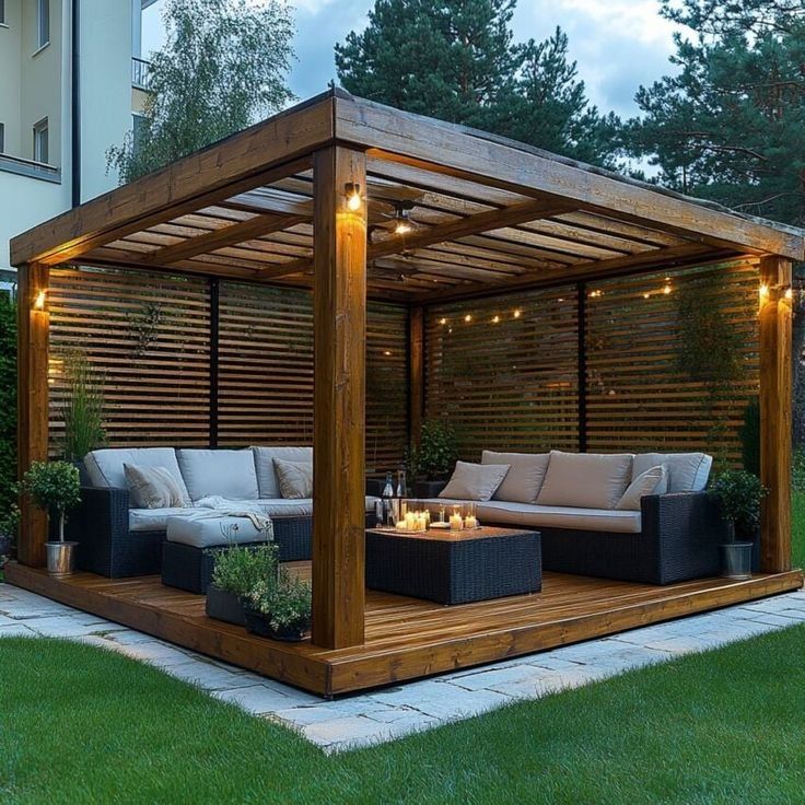 Wood Pergola with Slatted Privacy Walls and Candlelit Seating